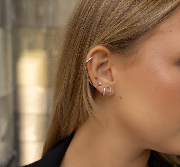 Crescent moon piercing