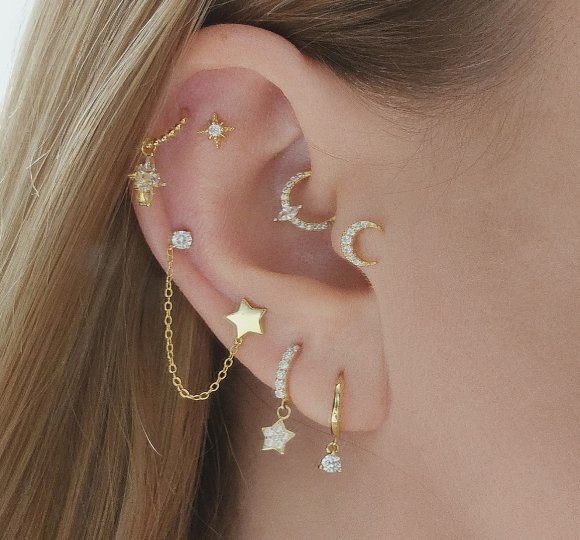 Crescent moon piercing
